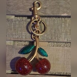 COACH CHERRY GLITTER BAG CHARM/ KEYCHAIN.